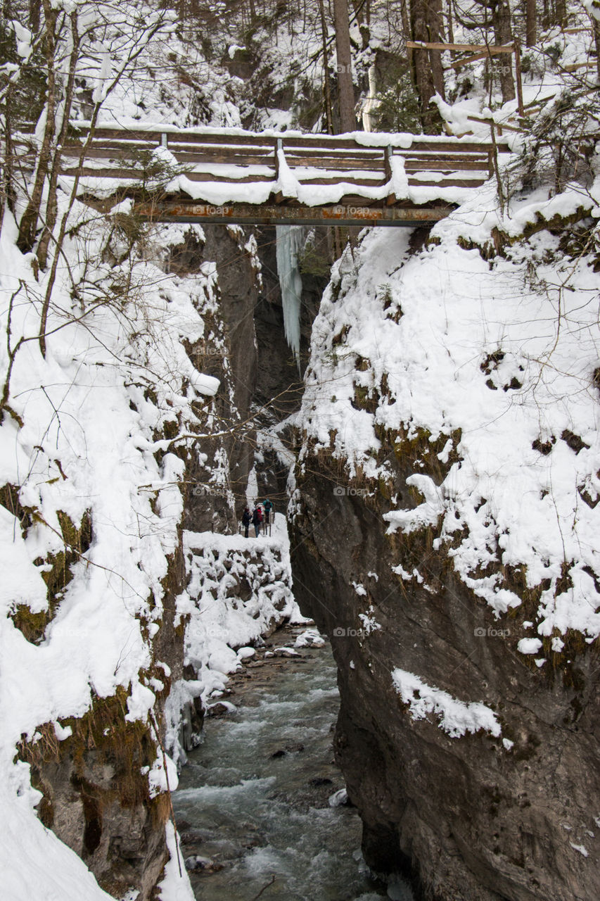 View of bridge over river during winter