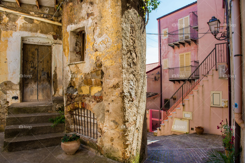 Old street corner in the city of Sefalu on Sicily.