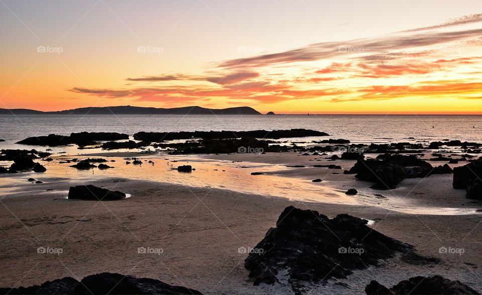 Scenic view of beach during sunset