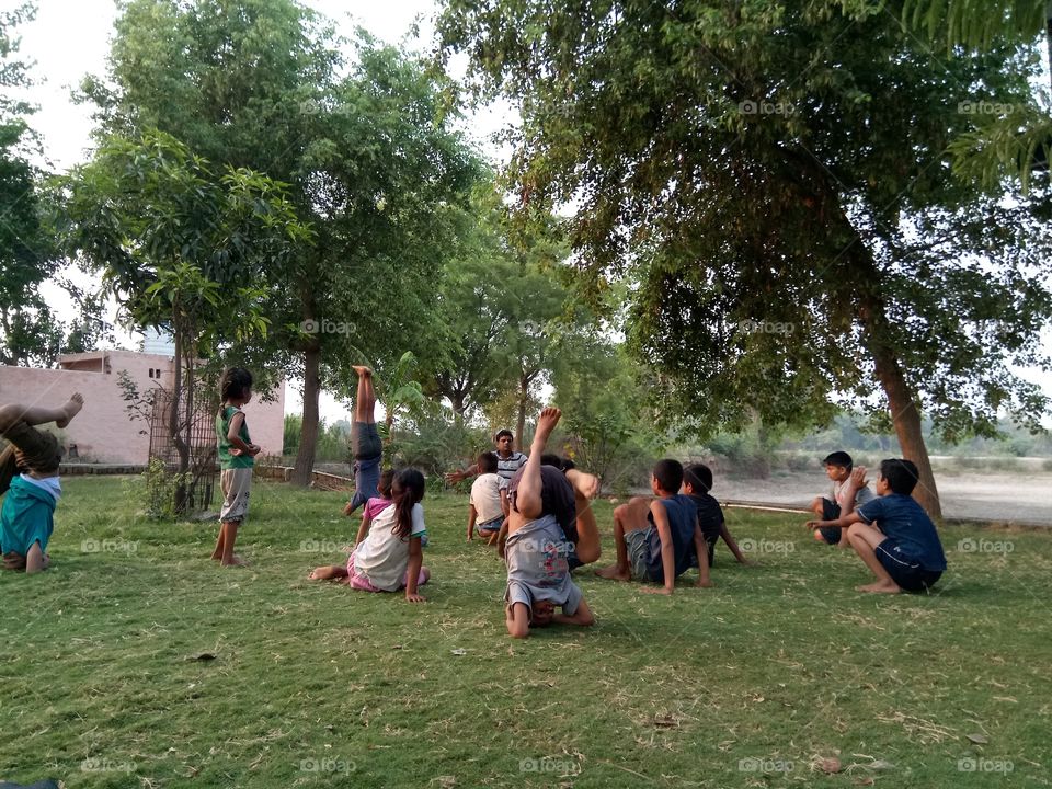 children participating in yoga classes