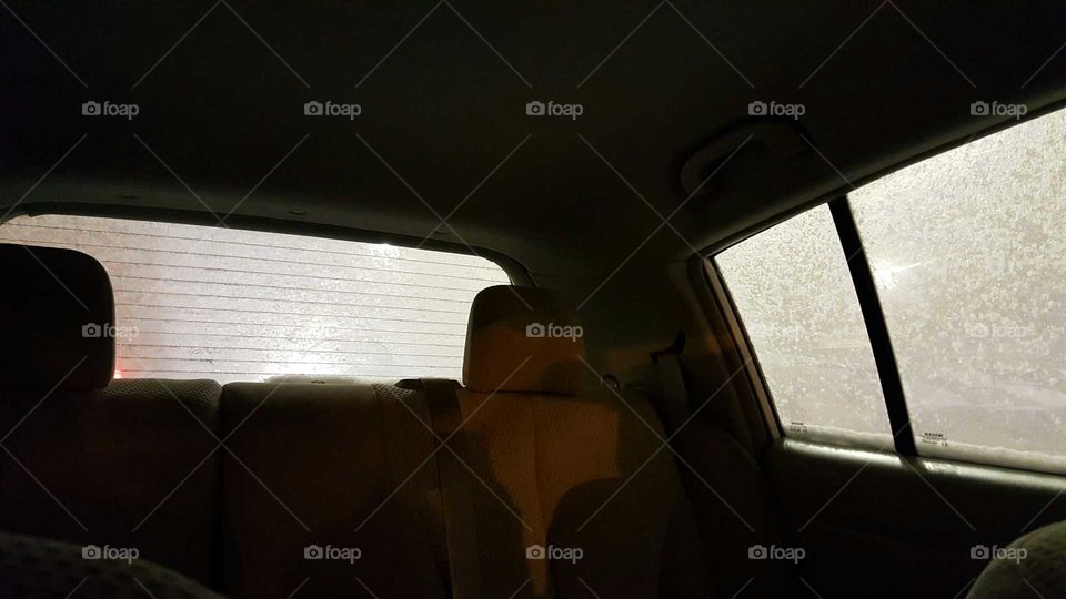 The back seat of a car wh