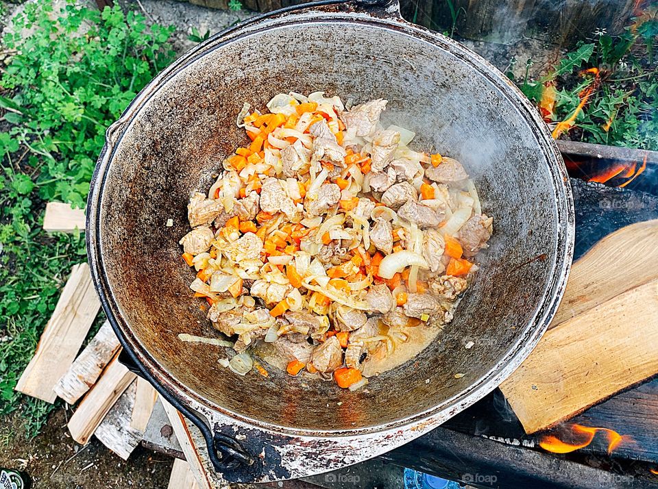 Cooking food on the campfire