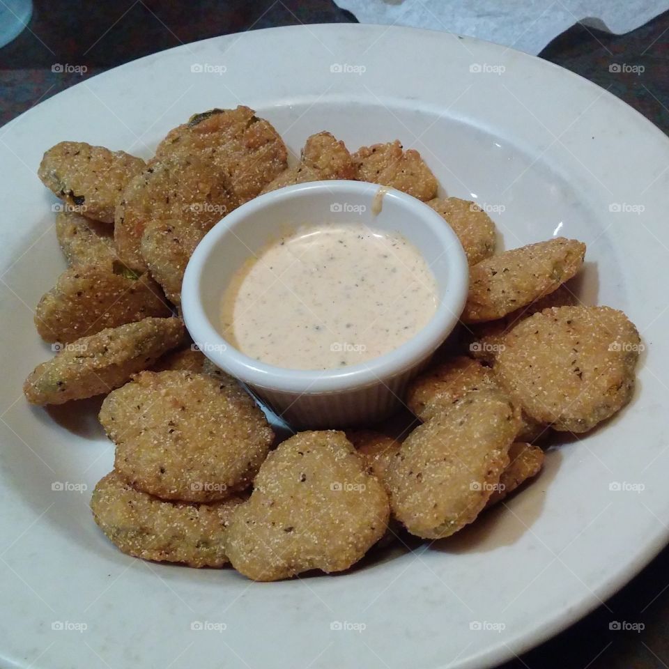 fried pickles . first time eating them