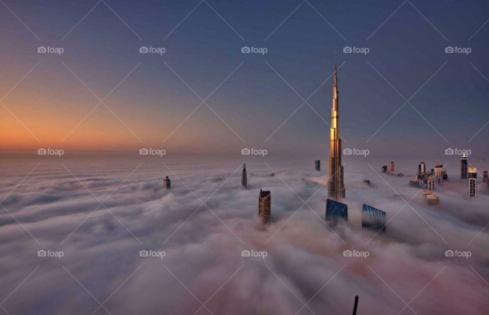 Cityscape above the clouds 