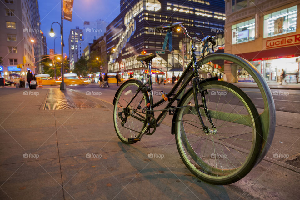 Bicycle on a streets of New York City, waiting for a ride