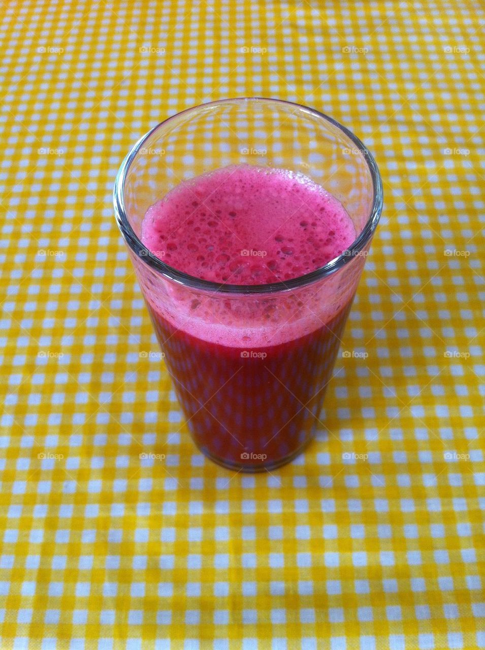 Smoothie of orange juice,lemon and red beet for an healthy breakfast