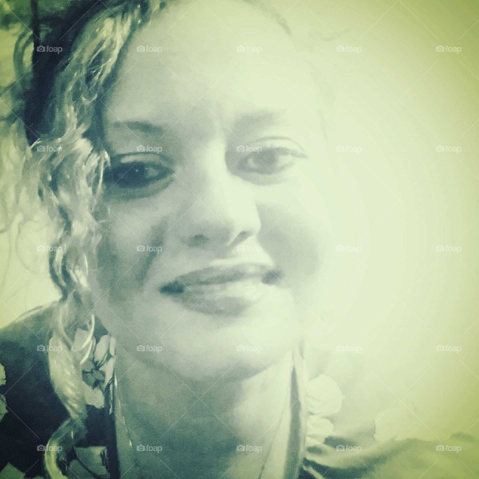 Smiling chick in monotone photo op.