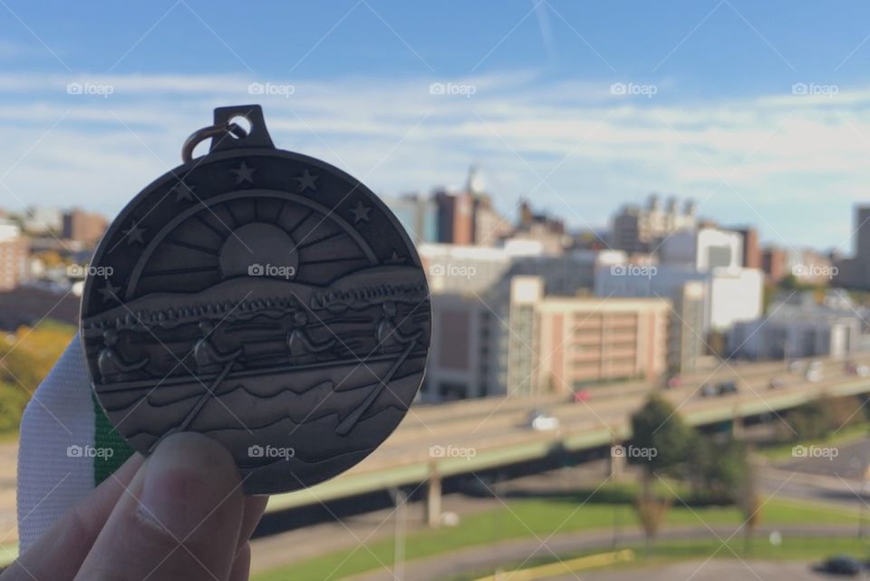 Rowstrong Regatta was a success. All proceeds raised go to cancer research at Upstate University Hospital, seen in the background.