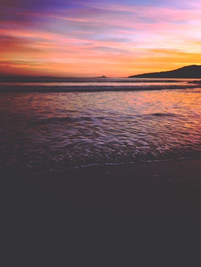 Beach shore at sunset