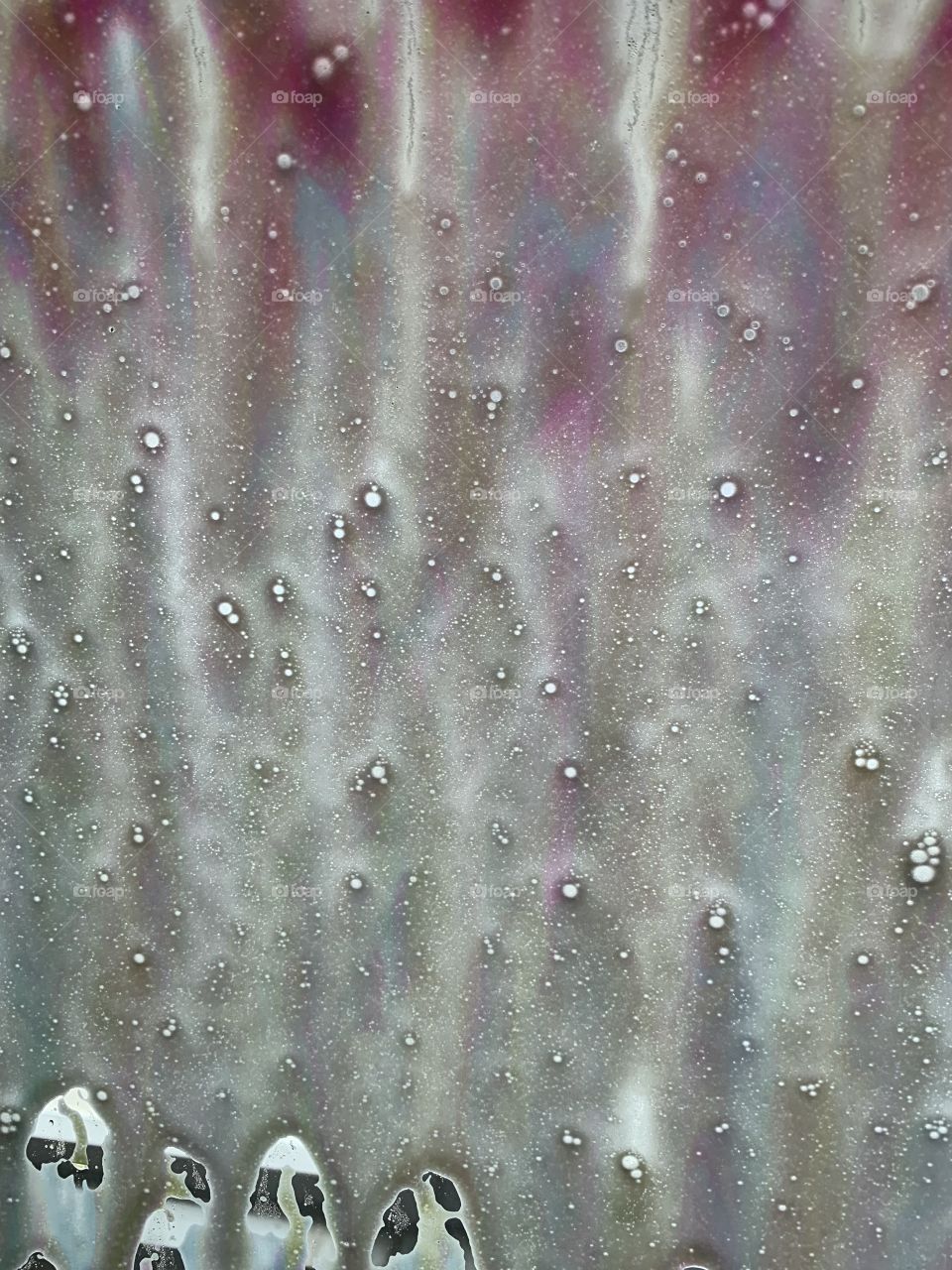 Soap on the window at the car wash 