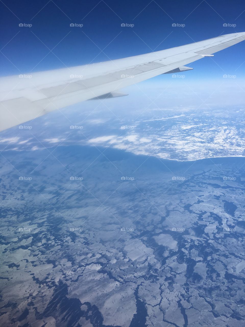 View of ice from the plane window.