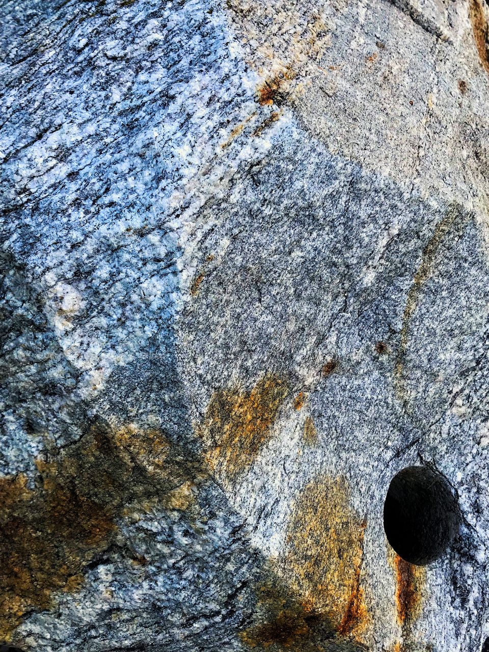 Boulder with drill hole