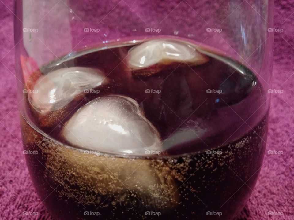 Stock style photo of soda in a glass.
