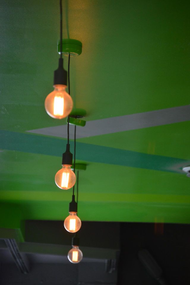 Light bulbs on green ceiling