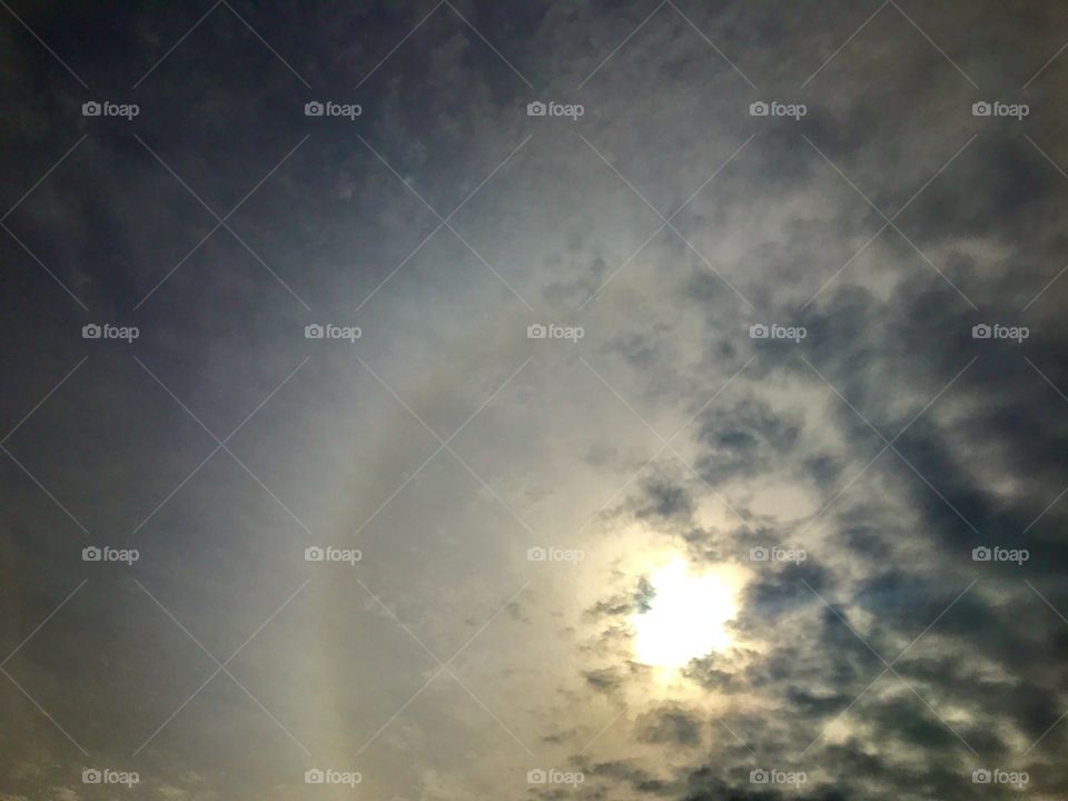 Sun peeking through clouds 