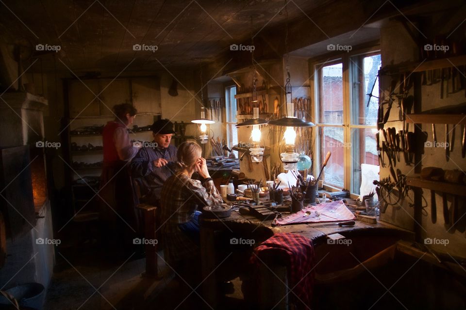 Group of people working in workshop