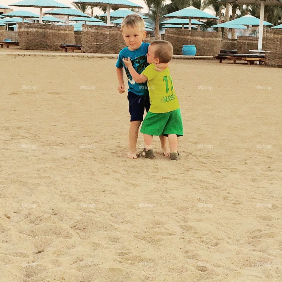 Boys at the beach . Little boys at the beach