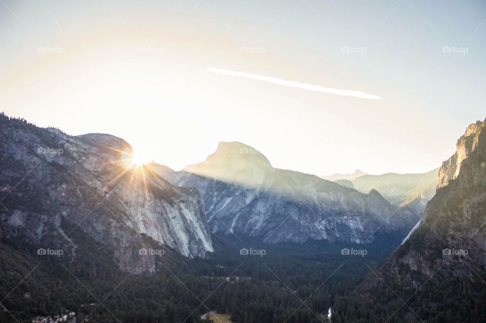 Light beams in the mountains. Taken at sunrise in Yosemite 