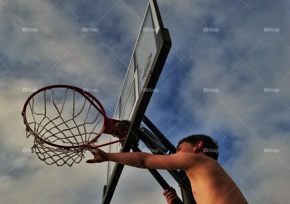 Boy Playing Basketball
