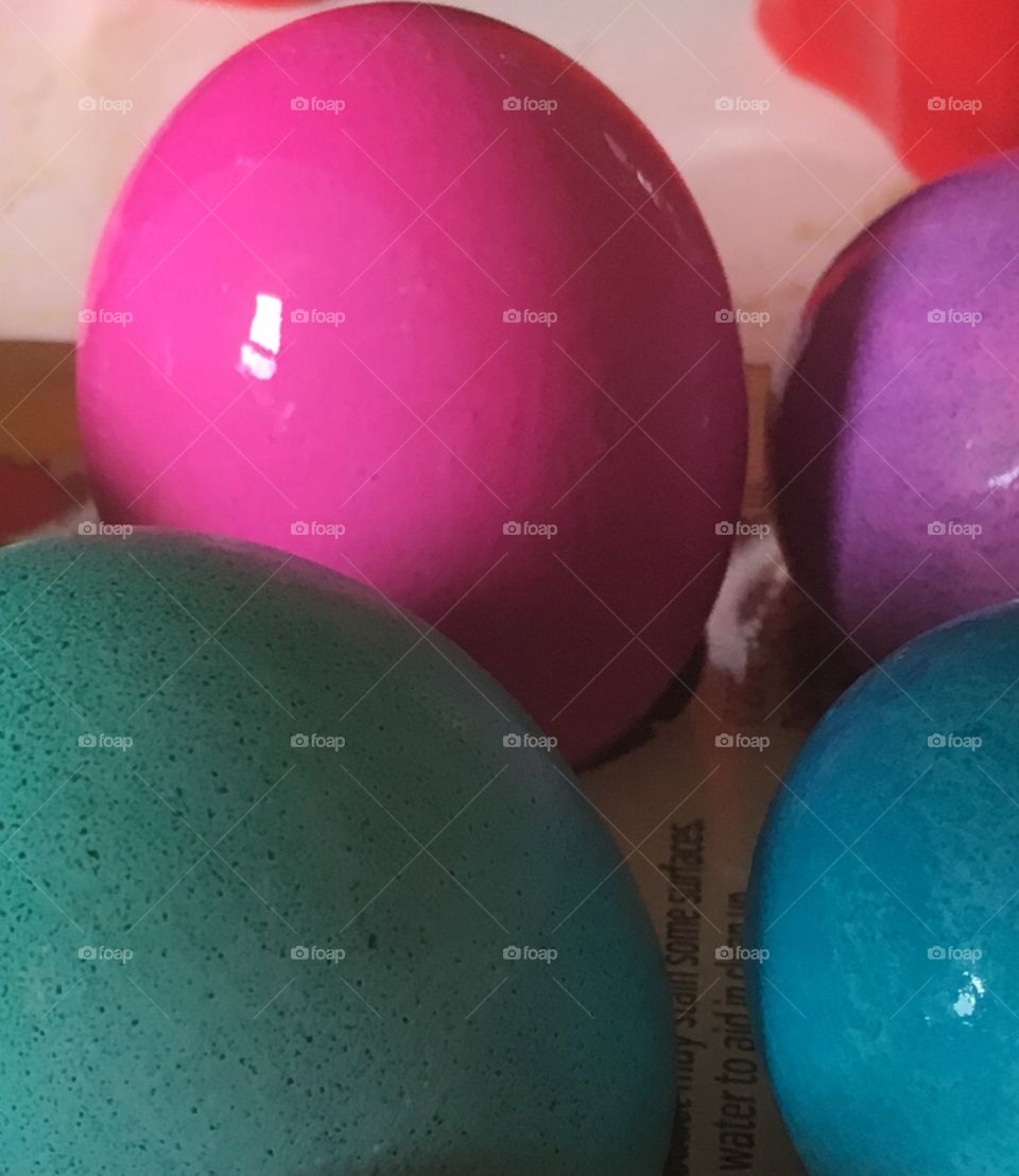 Crop of Easter eggs drying after being dyed.  