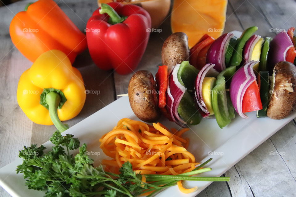 Colorful vegetables from garden displayed on white dish