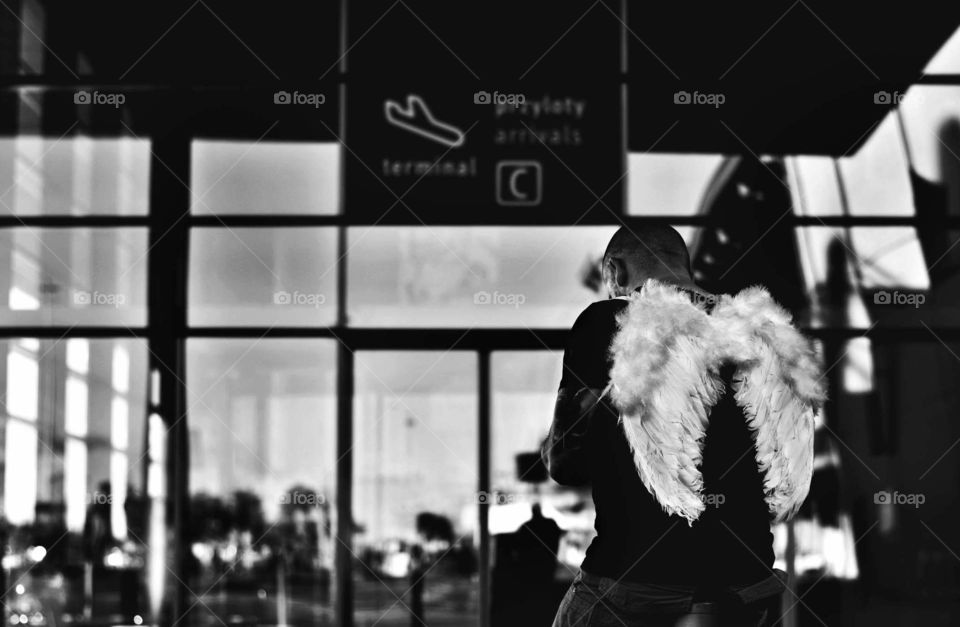 Angel at the airport. Flight is cancelled...