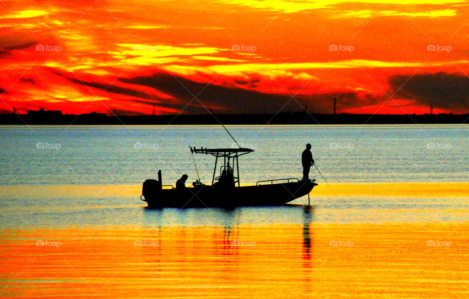 Fisherman on a boat by Tampa Bay, Clearwater, Florida, U.S.A