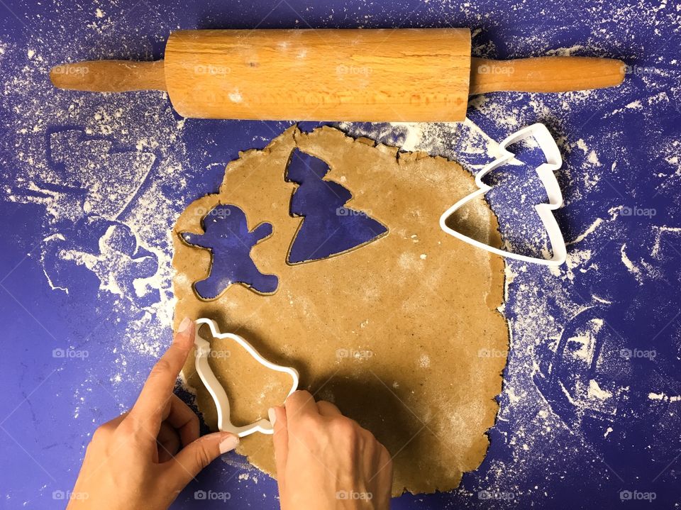 Person preparing christmas cookies