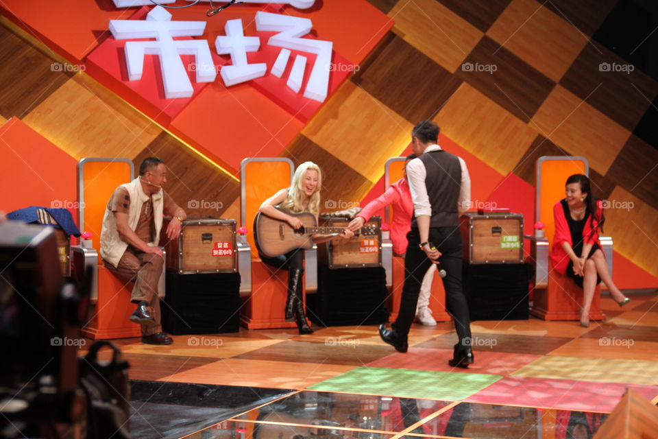 Let me play my guitar ! Funny Joke at television show 