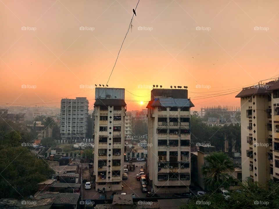 #nature #building #skyline #towers #sunrise #morning #dawntime #yellowlights #goldenhour #birds #nature #sun #citylife #mumbai #city #metrolife