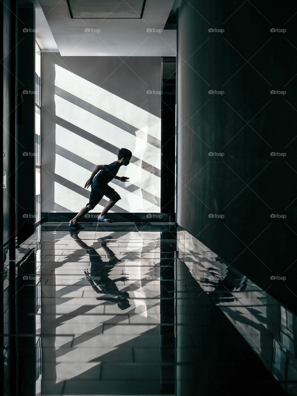 Shadow play in the hotel corridor