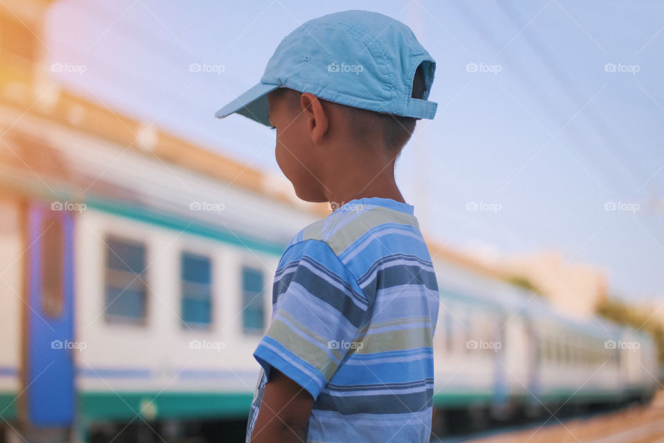 Waiting for the right train to come...A kid’s experience...