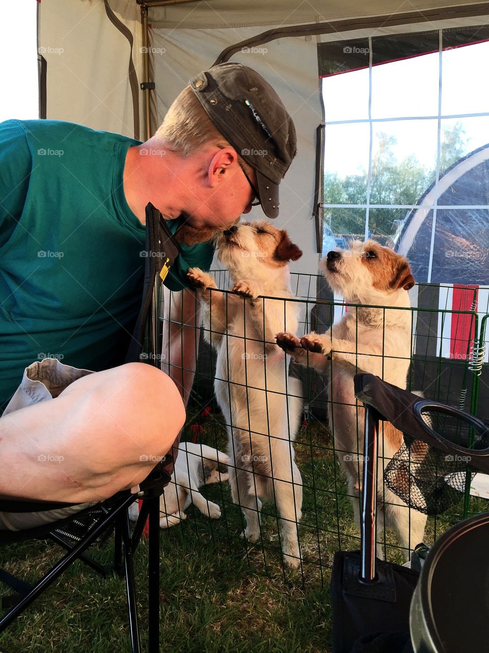 Man talking to his dogs