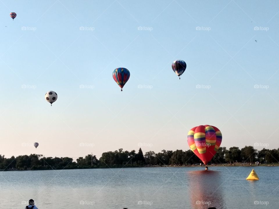 balloons over water