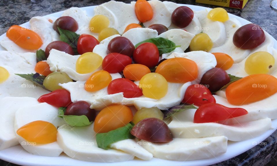 Heirloom Tomato & Mozzarella. A beautifully presented salad at a fun get together 