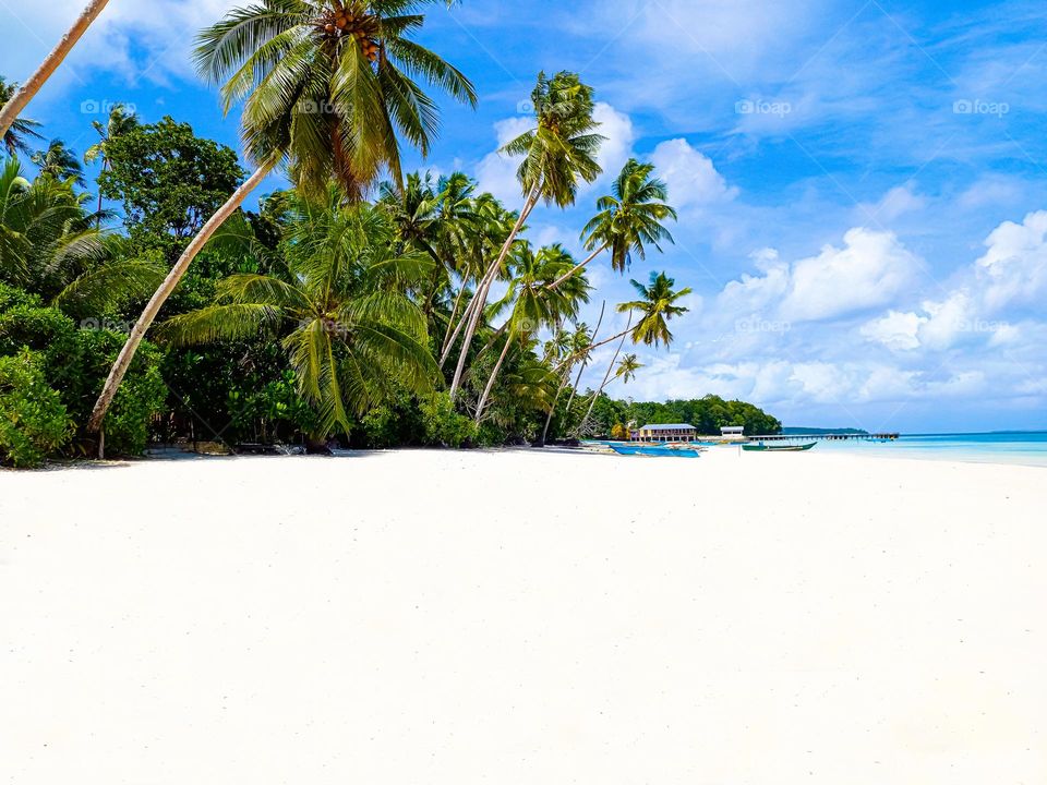 Charm of the beauty of the beach with the softest white sand number 2 in the world (Ngurbloat Beach / Pasir Panjang Beach)