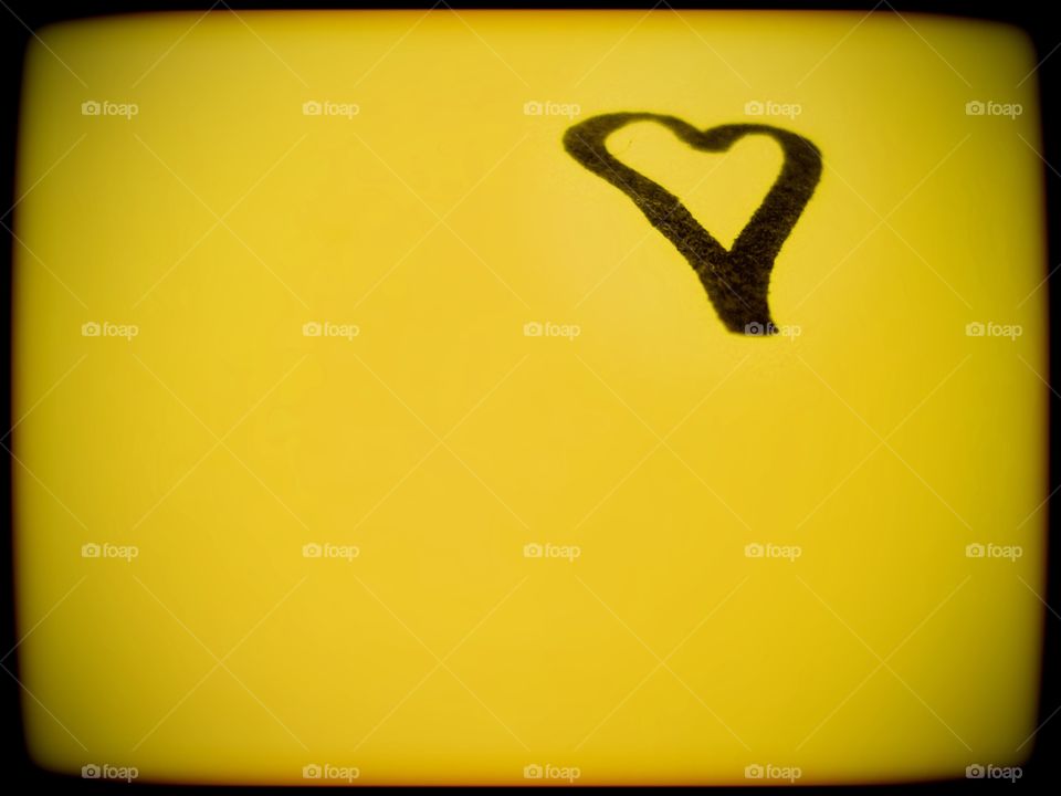 A Notable Heart — Hand-drawn heart on a yellow Post-It note.