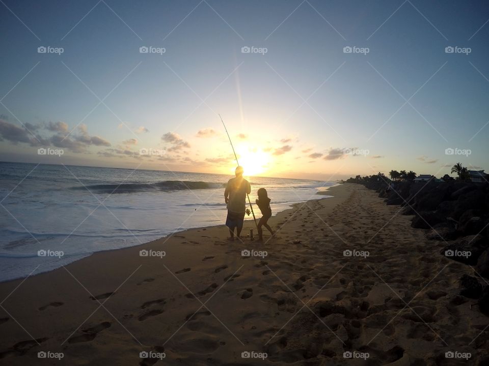 Father and daughter fishing! Hawaiian natives 