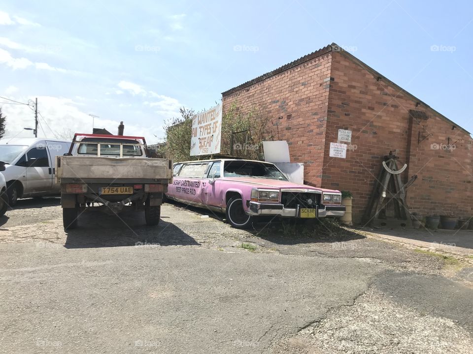 Scrap Cars sought, by the look of the pink car, the buyers are not fussy haha
