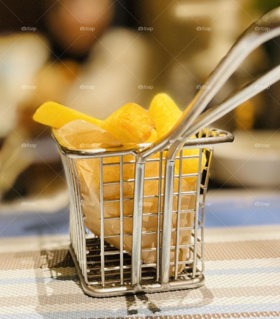 french fries in basket 