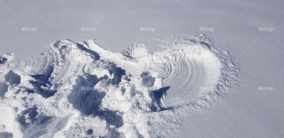 Angel fallen on the snow....