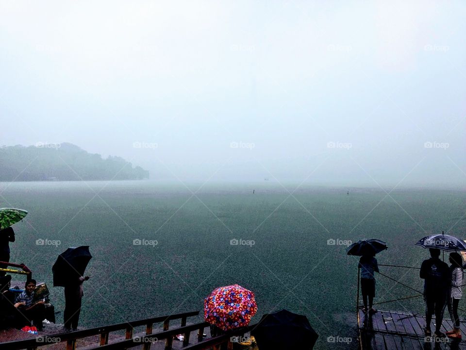 Rain droplets of blessings falling from sky,
making surface sliver shiniy like UFO coming by, standing at bae of Pawai lake seeing water in droplets in one moment and with infinte deepth in next one. Making thousands of tiny circles as they both meet