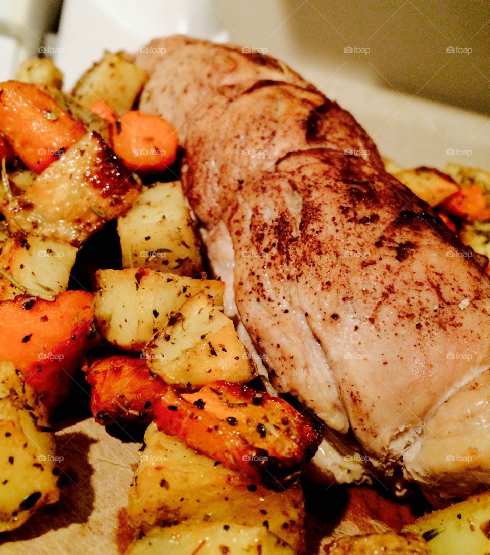 Roasted pork, carrots and potatoes