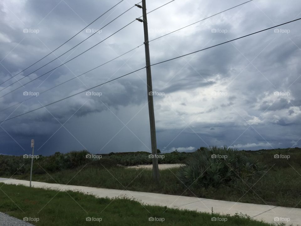 Curtain of rain as a summer storm approaches the Florida coast.