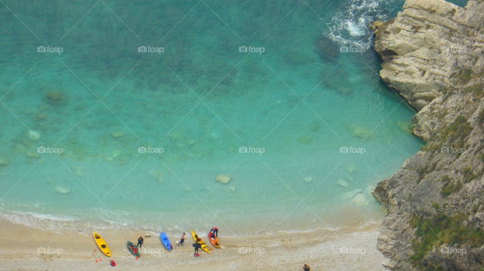 Canoe over the beach . Canoe over the beach in the bay,Italy