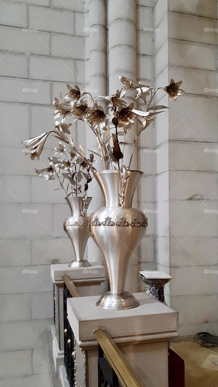 Metal vases with metal flowers 