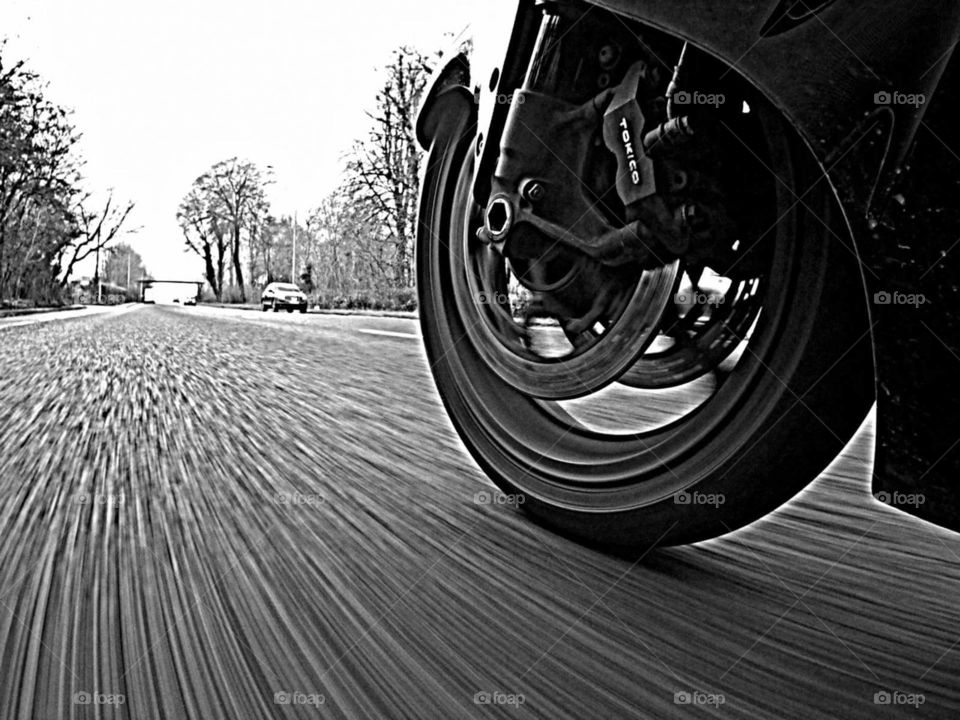 motorcycle wheel at speed