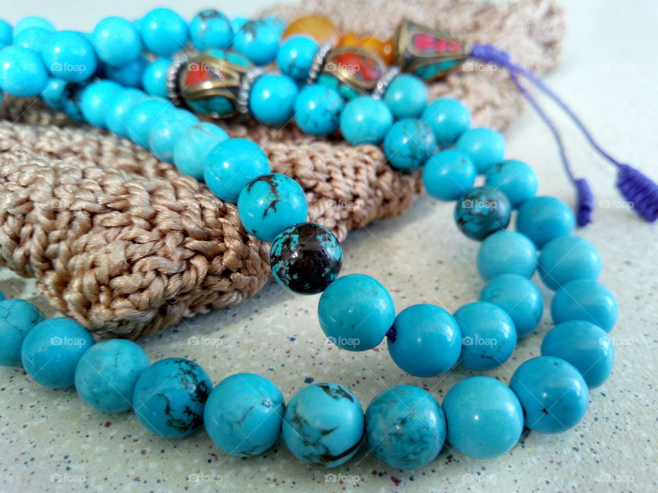 Buddhist rosary of turquoise and coral
