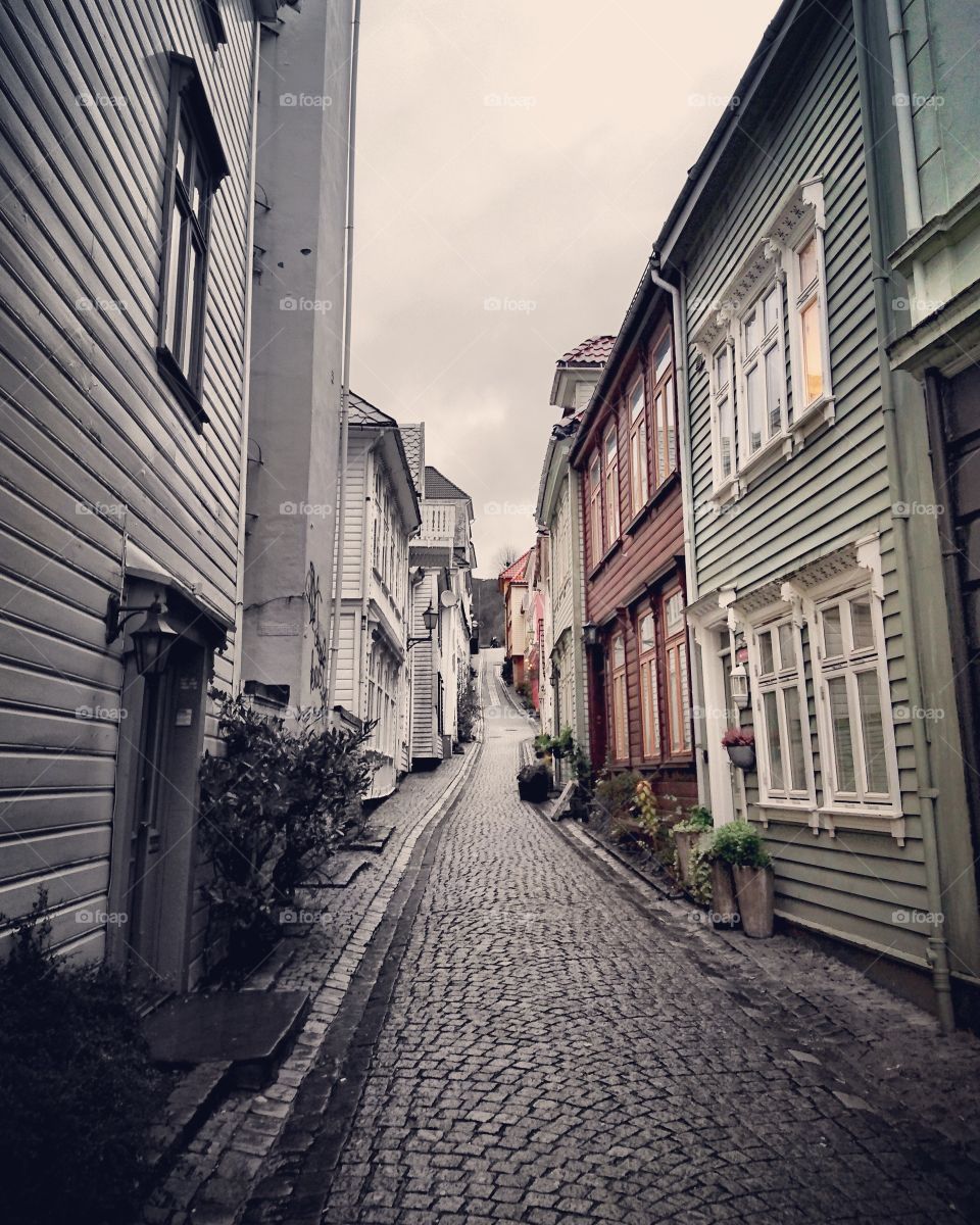 Narrow alley along buildings