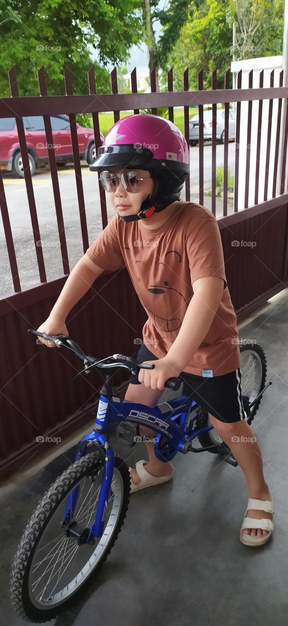 The boy ready to go out with safety preparation